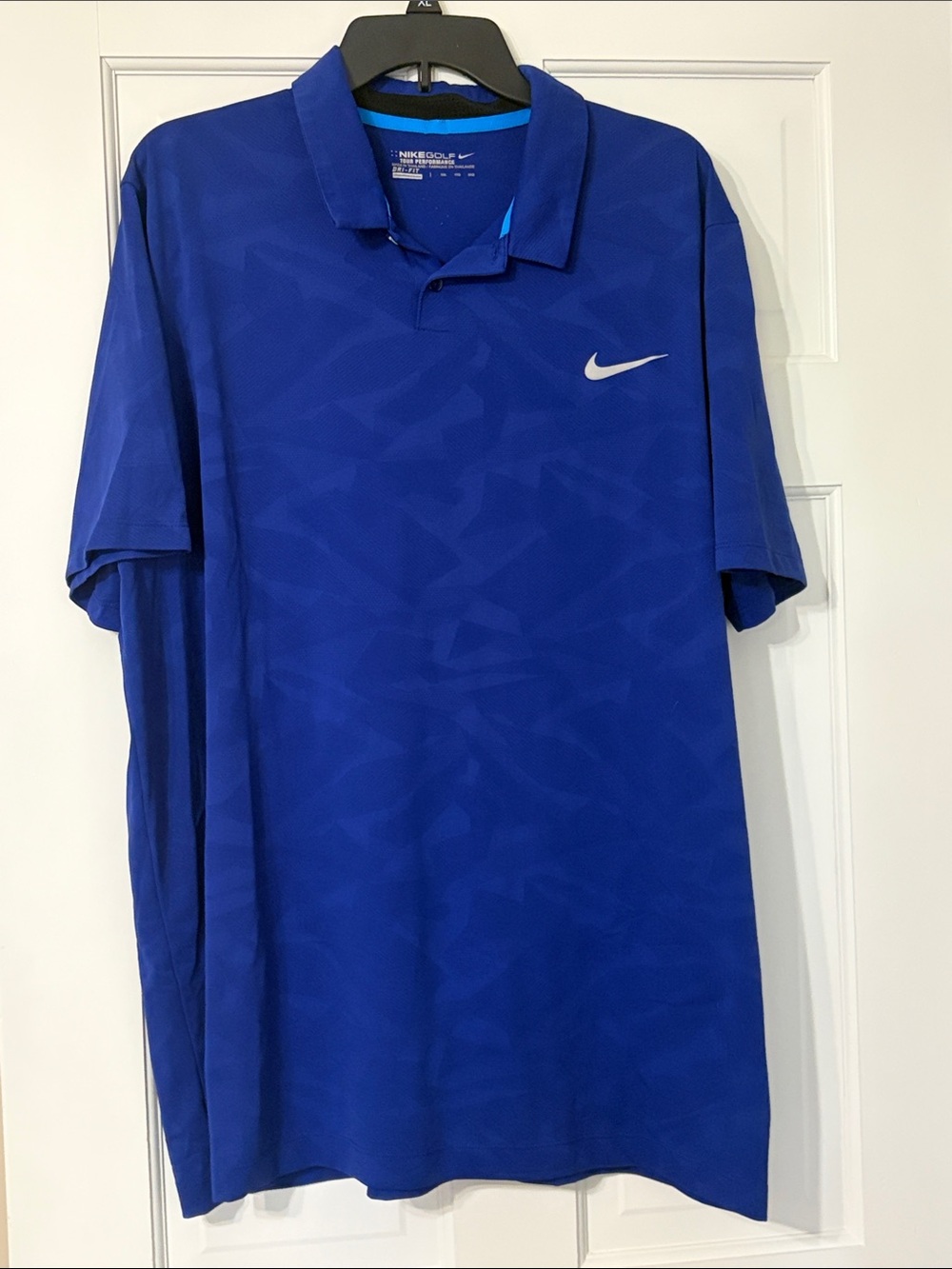 Nike Men’s Royal Blue Polo with White Swoosh